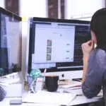 person looking at laptop